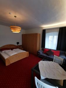 Postel nebo postele na pokoji v ubytování Bed & Breakfast Goldener Stiefel