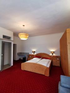 Postel nebo postele na pokoji v ubytování Bed & Breakfast Goldener Stiefel
