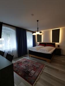 Postel nebo postele na pokoji v ubytování Bed & Breakfast Goldener Stiefel