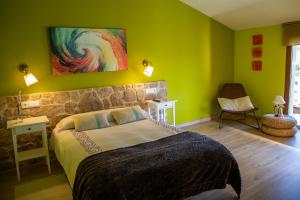 Postel nebo postele na pokoji v ubytování Hotel Rural El Tejar de Miro