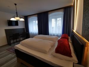 Postel nebo postele na pokoji v ubytování Bed & Breakfast Goldener Stiefel
