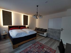 Postel nebo postele na pokoji v ubytování Bed & Breakfast Goldener Stiefel