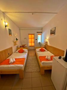 Postel nebo postele na pokoji v ubytování Hotel Magnólia