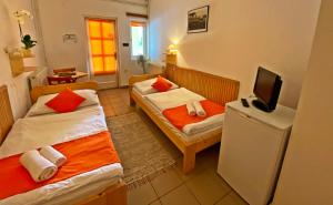 Postel nebo postele na pokoji v ubytování Hotel Magnólia