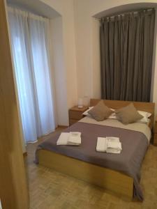 Llit o llits en una habitació de Affittacamere Iris
