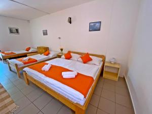 Postel nebo postele na pokoji v ubytování Hotel Magnólia