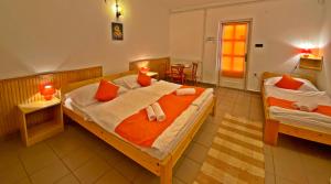 Postel nebo postele na pokoji v ubytování Hotel Magnólia