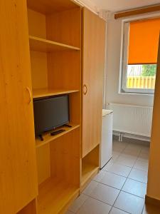 TV a/nebo společenská místnost v ubytování Hotel Magnólia