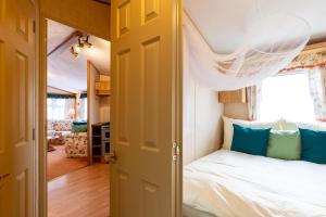Кровать или кровати в номере Ubytování v Lednici
