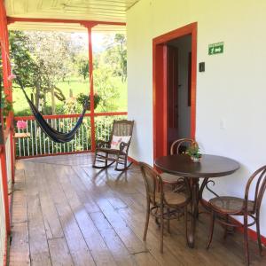 En balkong eller terrasse på La Cabaña Ecohotel - Valle del Cocora