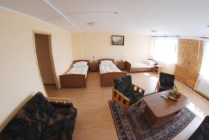 Posteľ alebo postele v izbe v ubytovaní Hotel Gołuń