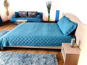 Un pat sau paturi într-o cameră la Vila Adriana