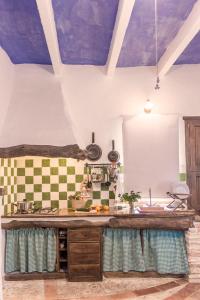 Kuchyň nebo kuchyňský kout v ubytování Les Olles