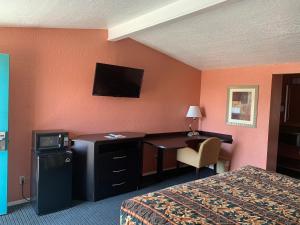TV a/nebo společenská místnost v ubytování Royal Inn Borger