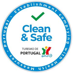 a blue clean and safe logo with a person in the middle at Casas do Rio in Cossourado