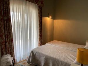 Łóżko lub łóżka w pokoju w obiekcie Casa Rural La Alcornocosa