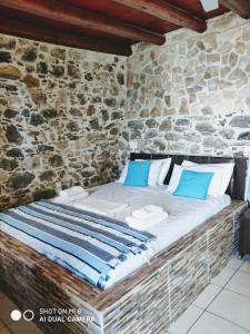 Postel nebo postele na pokoji v ubytování Mariaeva Rooms