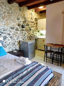 Kuchyň nebo kuchyňský kout v ubytování Mariaeva Rooms