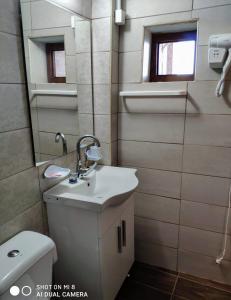 Koupelna v ubytování Mariaeva Rooms