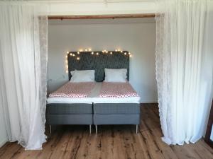 Postelja oz. postelje v sobi nastanitve Bottna Inn