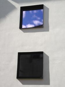 A television and/or entertainment centre at Agora Hostel