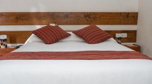 Rúm í herbergi á La Casona Real Cusco
