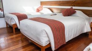 Rúm í herbergi á La Casona Real Cusco