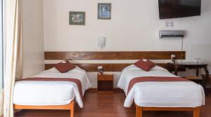 Rúm í herbergi á La Casona Real Cusco