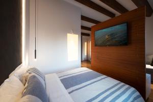 Posteľ alebo postele v izbe v ubytovaní Locanda Remare