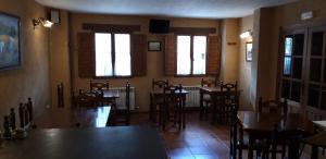 TV a/nebo společenská místnost v ubytování Pozolico Hotel Rural