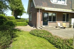Taman di luar Accommodatie op boerderij Buitenlust