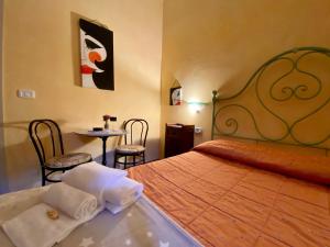 Een bed of bedden in een kamer bij B&B 8380 - Pian Del Molino