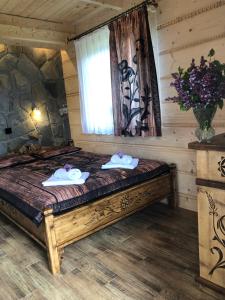 Posteľ alebo postele v izbe v ubytovaní Apartamenty Willa Szafran z widokiem na góry