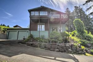 a house with a tower on top of it at Luxe Coastal Haven with Bay Views and Hot Tub in Bay City