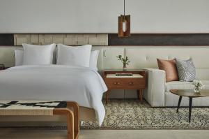 Postel nebo postele na pokoji v ubytování Four Seasons Resort Los Cabos