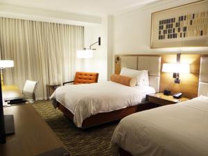 Rúm í herbergi á InterContinental Tegucigalpa at Multiplaza Mall by IHG