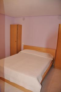 Кровать или кровати в номере Villa Petra