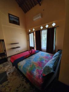 Łóżko lub łóżka w pokoju w obiekcie Botchan Hostel