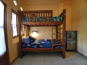 Łóżko lub łóżka w pokoju w obiekcie Botchan Hostel
