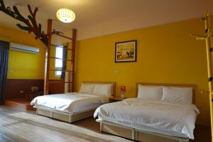 Postel nebo postele na pokoji v ubytování Provence Homestay