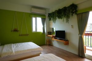 TV a/nebo společenská místnost v ubytování Provence Homestay