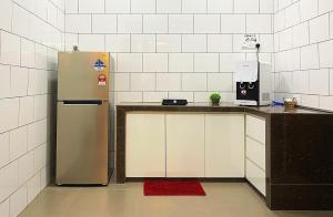 A kitchen or kitchenette at Amadel Residence 爱媄德民宿 13