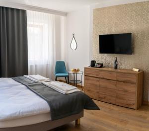 Krevet ili kreveti u jedinici u objektu Apartamenty, Boutique Rooms Villa 82, Parking