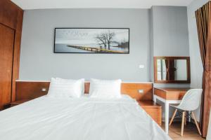 Postel nebo postele na pokoji v ubytování Catba Buffalo Hostel