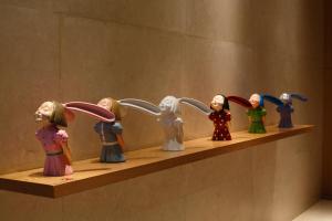 stuffed animals sitting on top of a wall at Andaz Xintiandi Shanghai-a concept by Hyatt in Shanghai