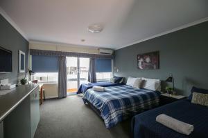 Bayview Hotel Woy Woy客房内的一张或多张床位