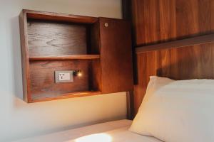 Postel nebo postele na pokoji v ubytování Catba Buffalo Hostel