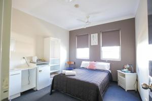 Bayview Hotel Woy Woy客房内的一张或多张床位