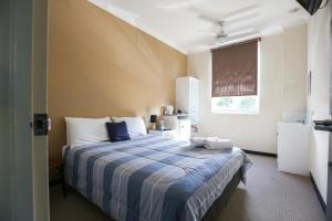 Bayview Hotel Woy Woy客房内的一张或多张床位