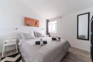 Postel nebo postele na pokoji v ubytování Apartment Mo-Mo